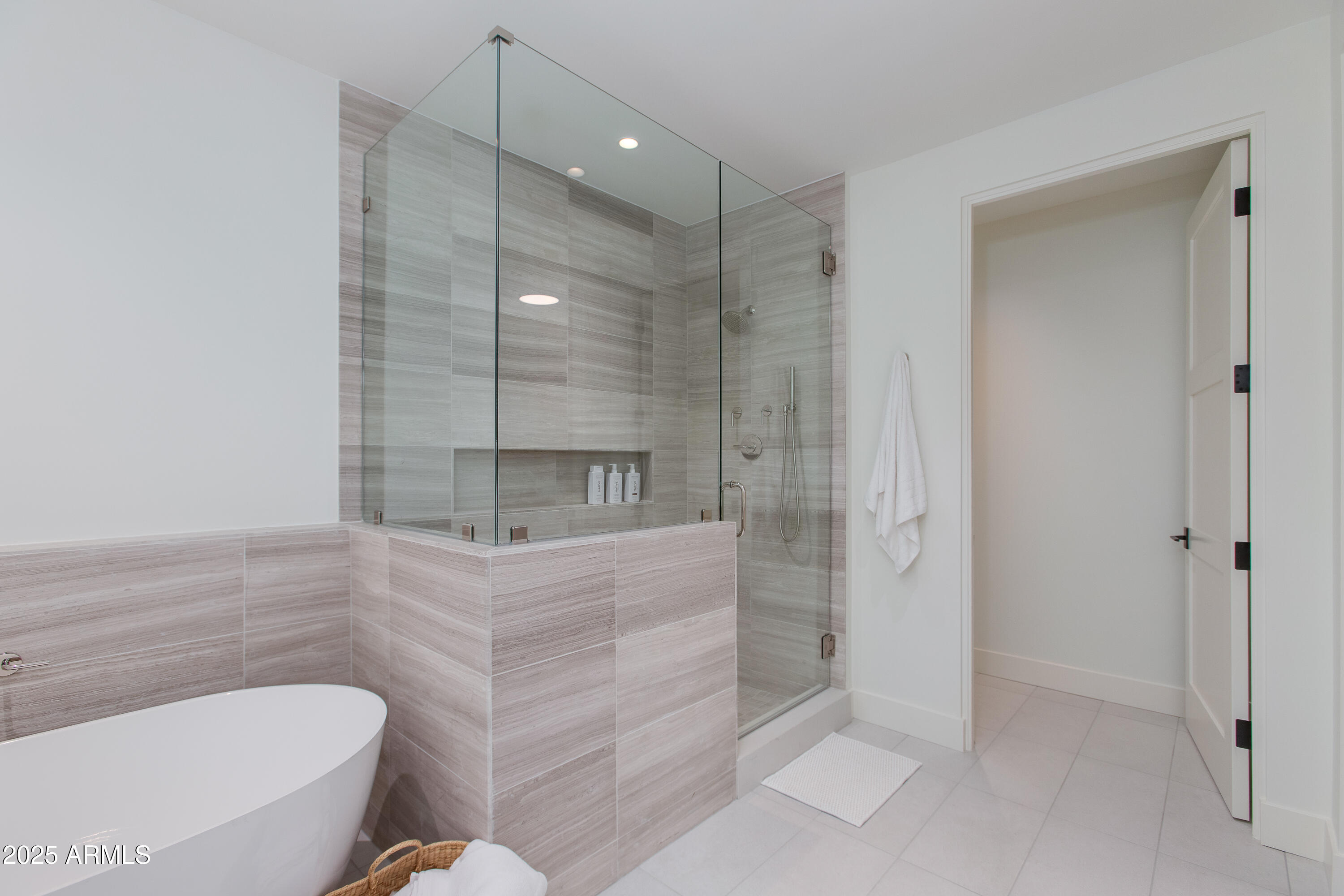 5000 North Camelback Ridge Drive, Unit 206 Scottsdale, AZ 85251 - Photo 28 of 62 a bathroom with a tub shower and sink
