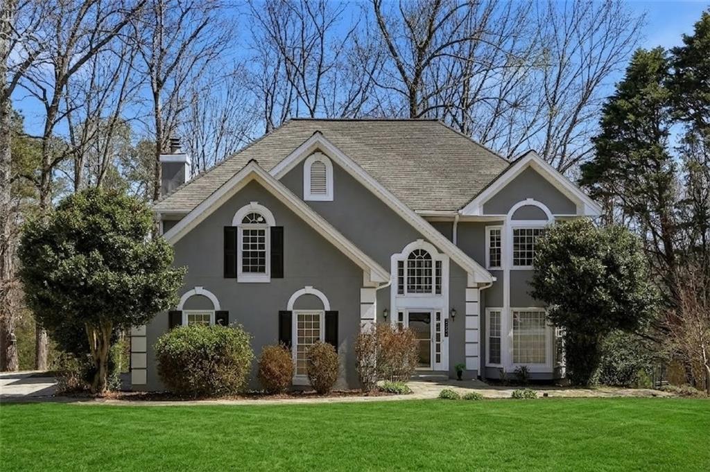 a house view with a garden space