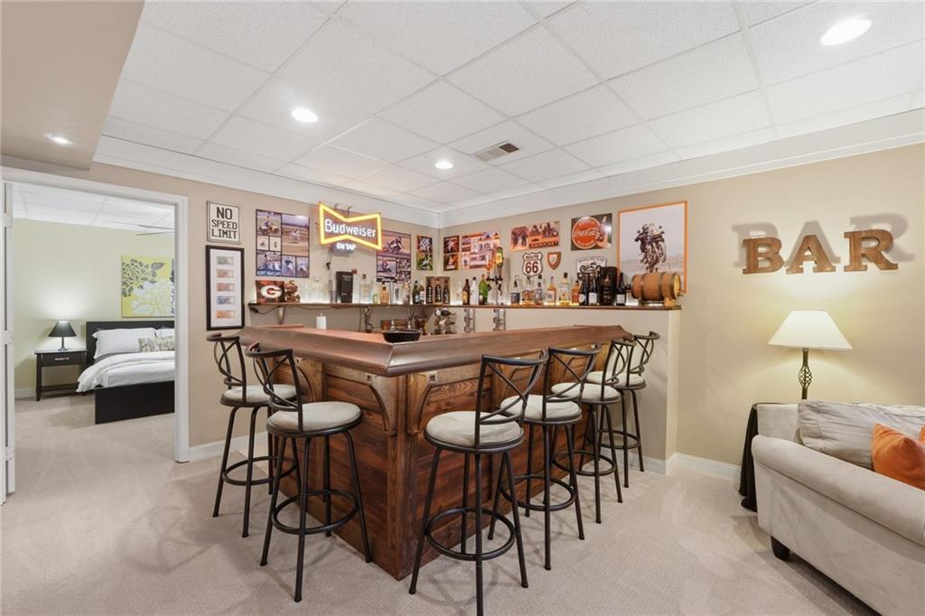 3341 Danielle Way Suwanee, GA 30024 - Photo 11 of 39 a view of a dining room with furniture and a large window