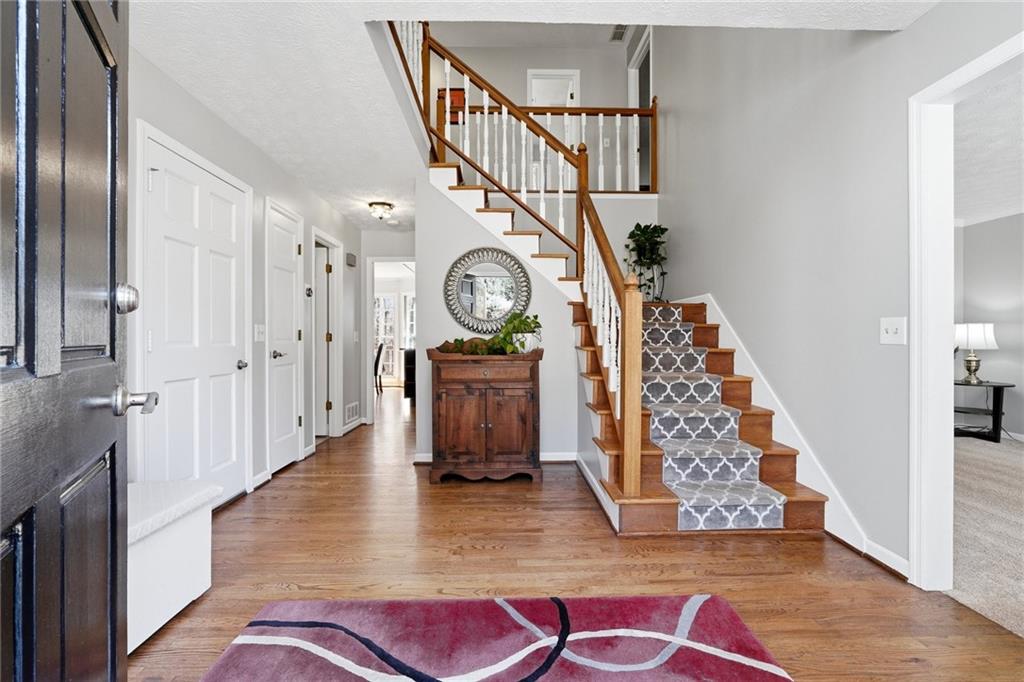 3341 Danielle Way Suwanee, GA 30024 - Photo 17 of 39 a view of entryway with wooden floor