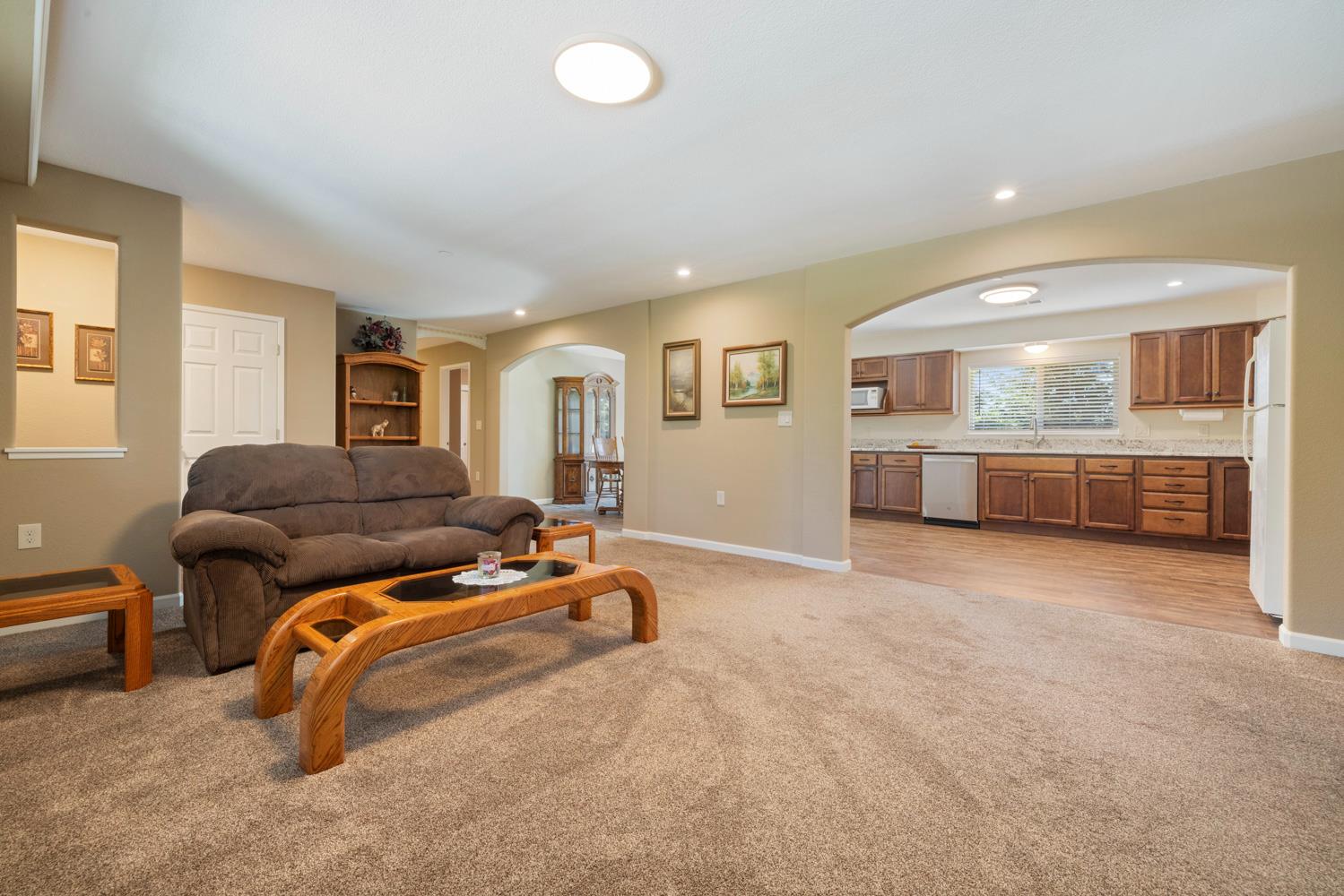 1255 Root Road Modesto, CA 95357 - Photo 11 of 52 a living room with furniture window and wooden floors