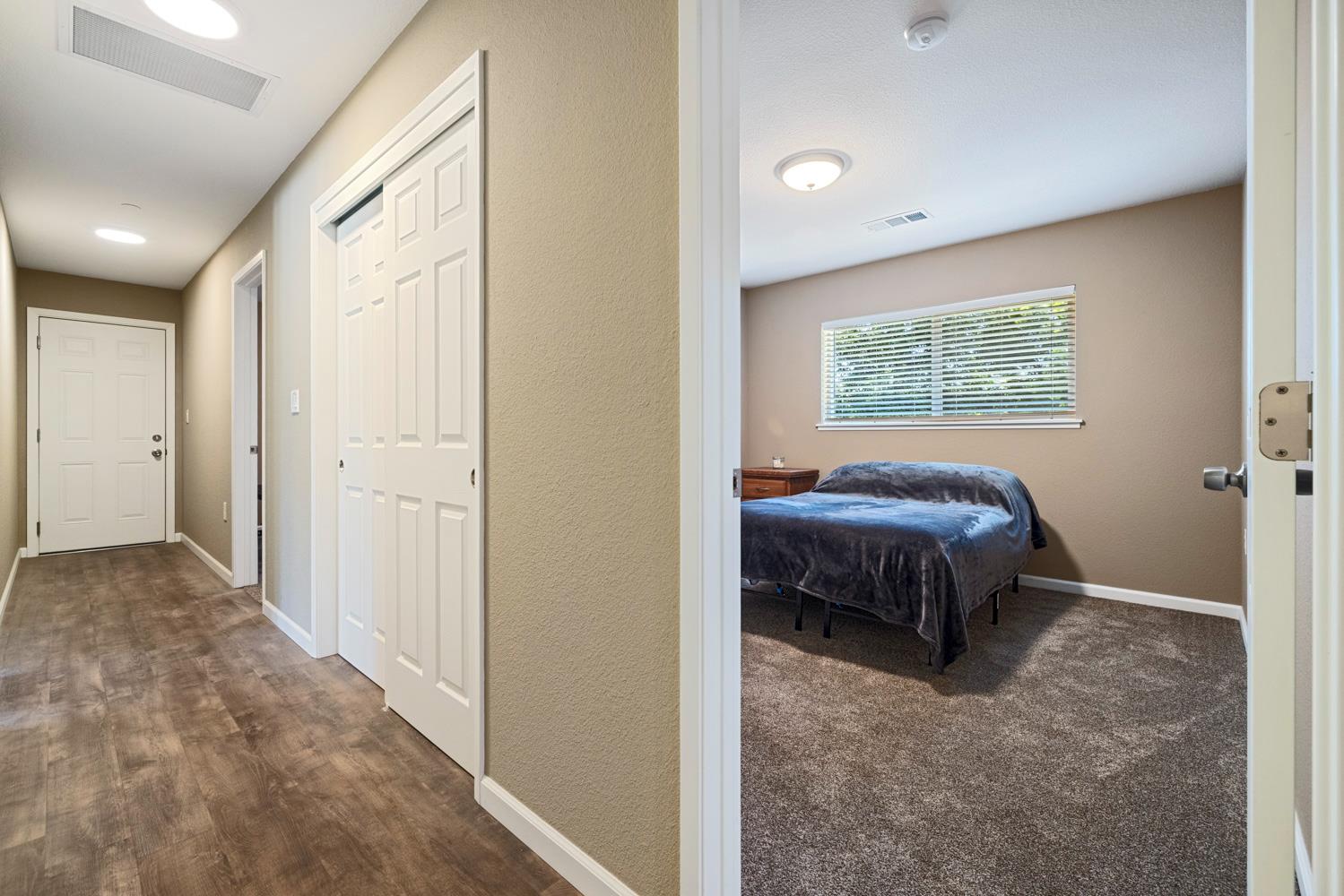 1255 Root Road Modesto, CA 95357 - Photo 28 of 52 a bedroom with a bed and a window