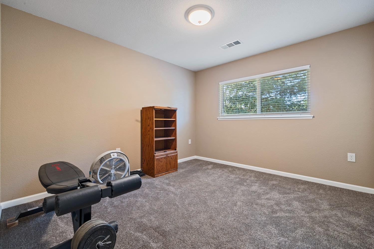 1255 Root Road Modesto, CA 95357 - Photo 34 of 52 a view of workspace with lounge chair