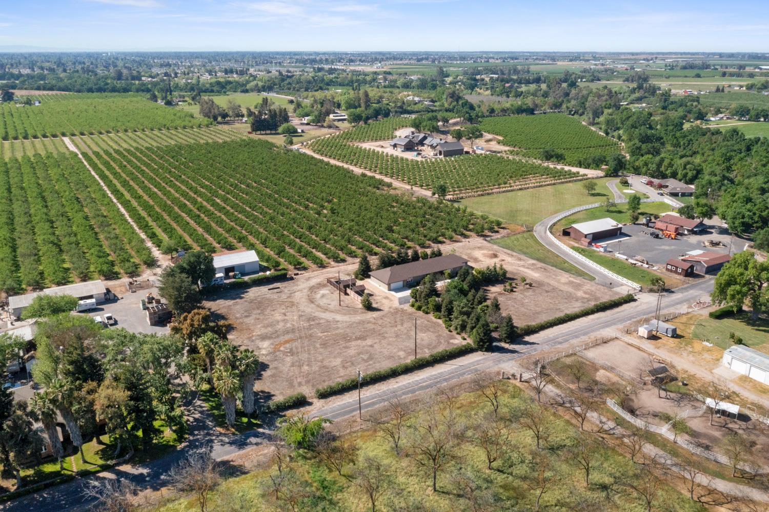 1255 Root Road Modesto, CA 95357 - Photo 45 of 52 an aerial view of a houses with a yard and lake view