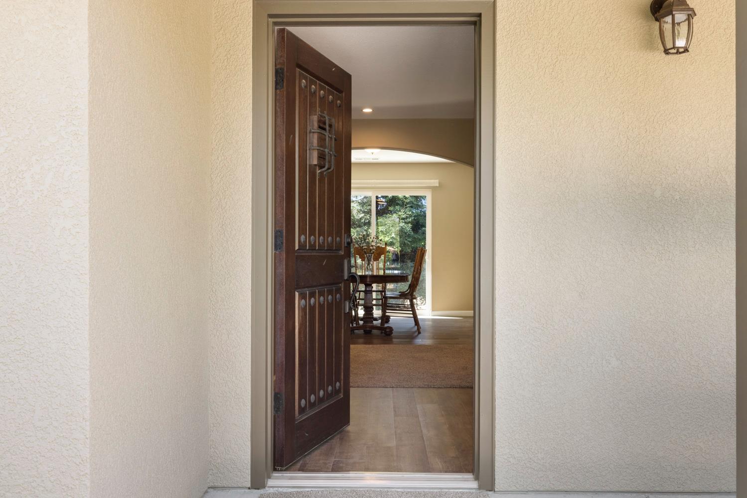 1255 Root Road Modesto, CA 95357 - Photo 7 of 52 a view of a glass door with a glass door