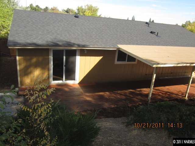 3916 Kings Row Reno, NV 89503 - Photo 2 of 10 a front view of a house with a yard