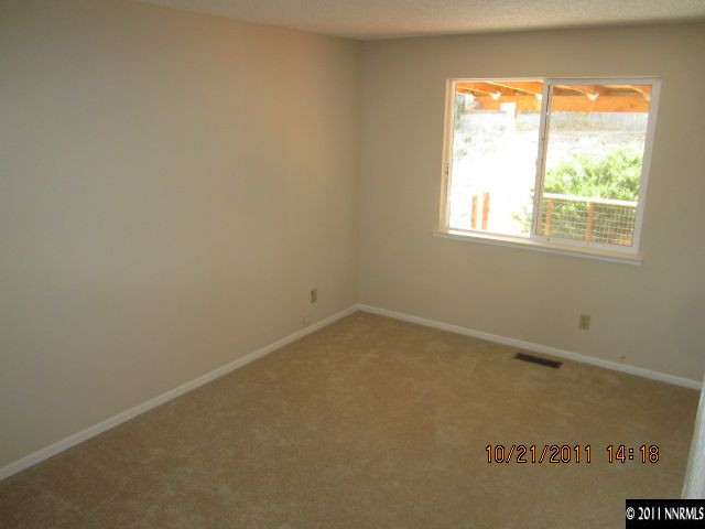 3916 Kings Row Reno, NV 89503 - Photo 8 of 10 an empty room with a window
