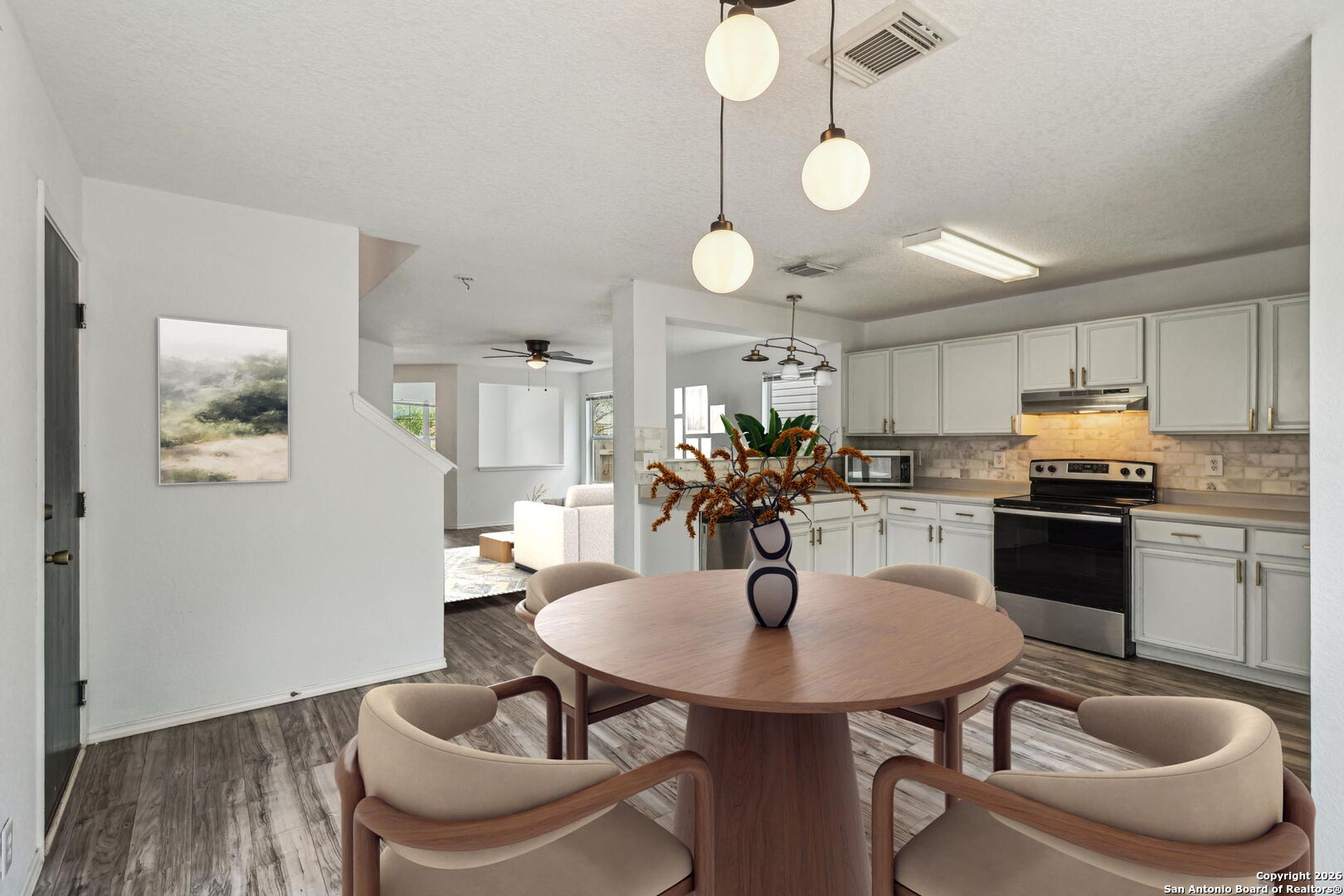 87 Kenrock Ridge San Antonio, TX 78254 - Photo 18 of 50 a kitchen with a table and chairs in it