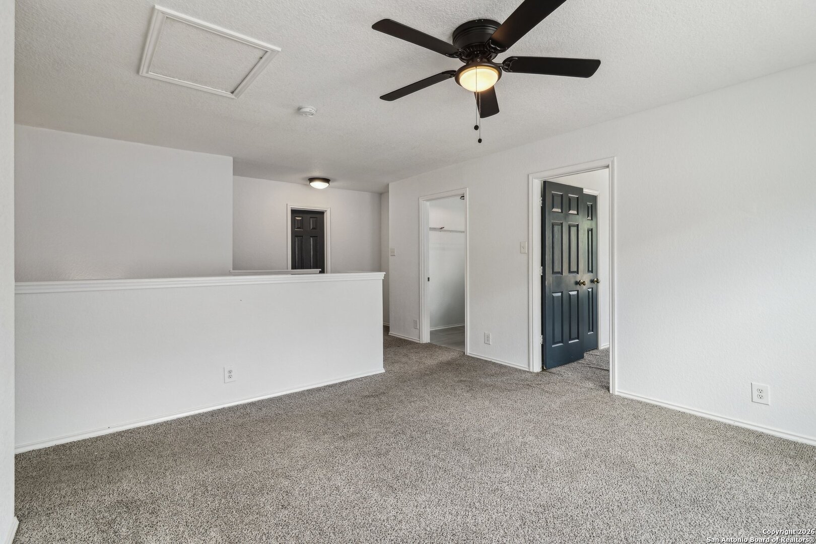 87 Kenrock Ridge San Antonio, TX 78254 - Photo 21 of 50 a view of a big room with closet and a ceiling fan