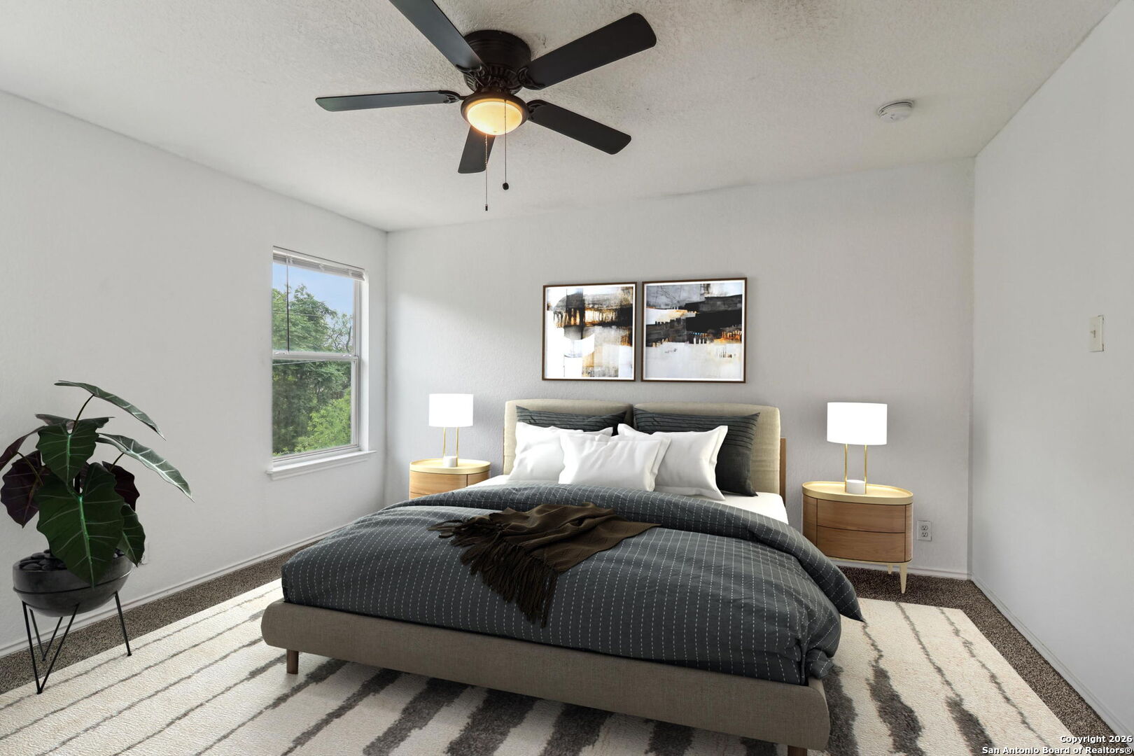 87 Kenrock Ridge San Antonio, TX 78254 - Photo 23 of 50 a bedroom with a bed and wooden floor