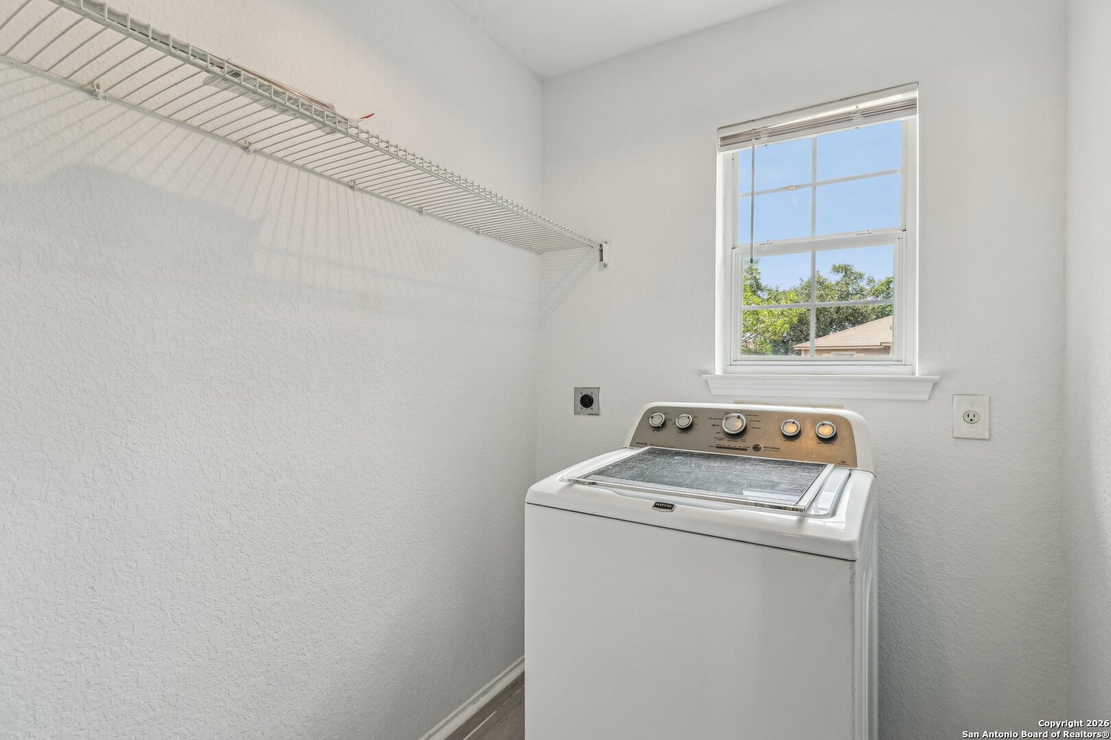 87 Kenrock Ridge San Antonio, TX 78254 - Photo 29 of 50 a utility room with dryer and washer