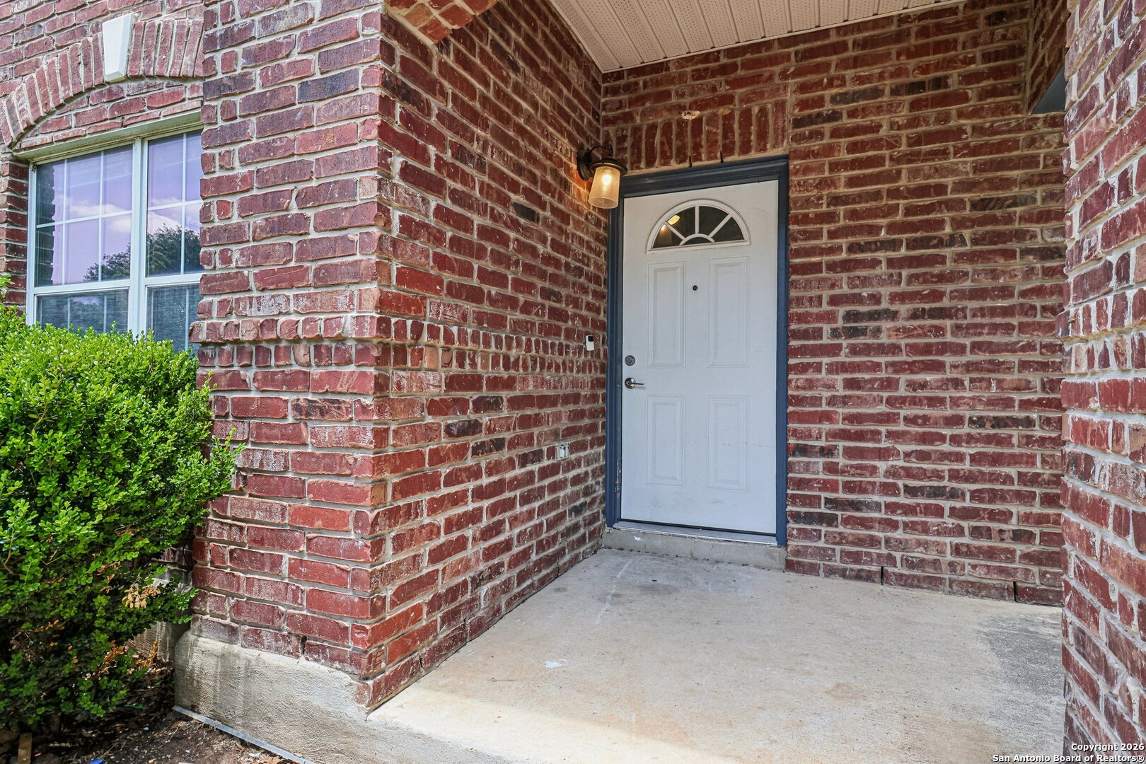 87 Kenrock Ridge San Antonio, TX 78254 - Photo 3 of 50 a view of a brick wall