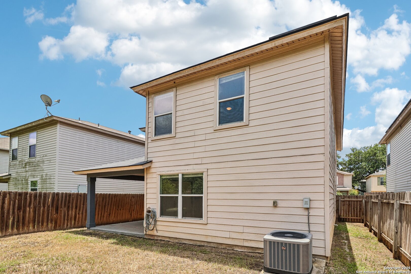 87 Kenrock Ridge San Antonio, TX 78254 - Photo 43 of 50 a view of a house with a backyard