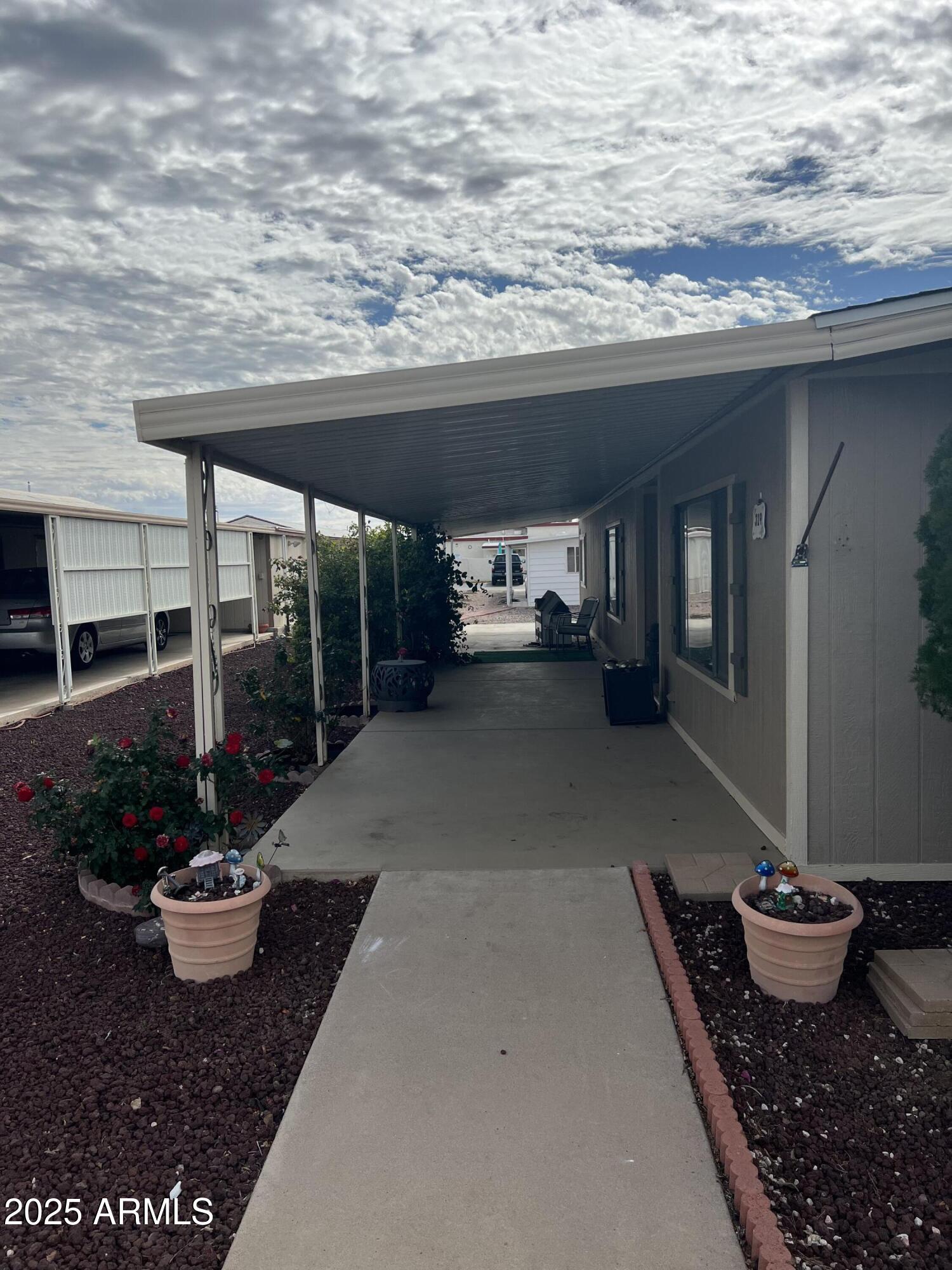 3330 East Main Street, Unit 319 Mesa, AZ 85213 - Photo 2 of 14 a living room with furniture