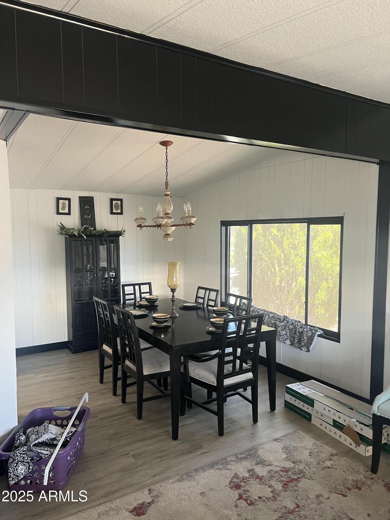 3330 East Main Street, Unit 319 Mesa, AZ 85213 - Photo 9 of 14 a view of a dining room with furniture