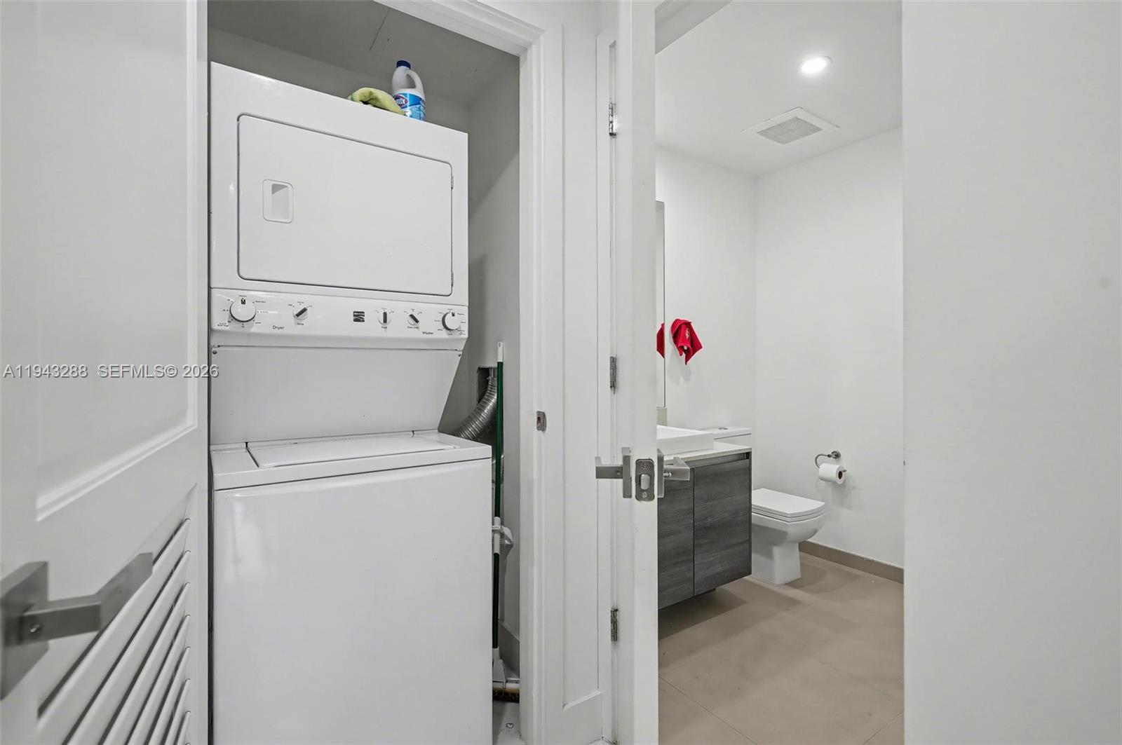 1080 Brickell Avenue, Unit 209 Miami, FL 33131 - Photo 22 of 37 a bathroom with a toilet and a sink