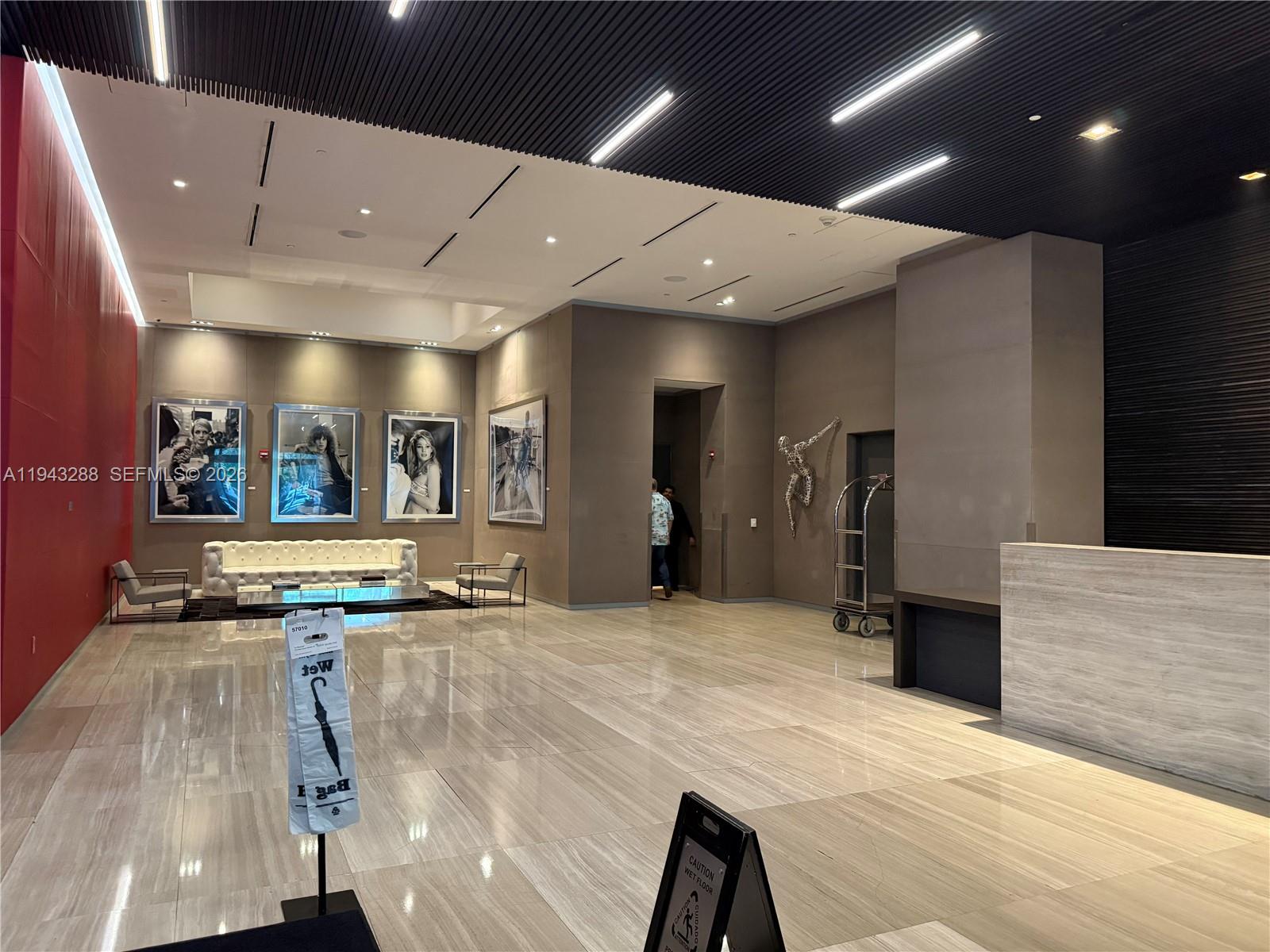 1080 Brickell Avenue, Unit 209 Miami, FL 33131 - Photo 27 of 37 a large room with lot of stainless steel appliances