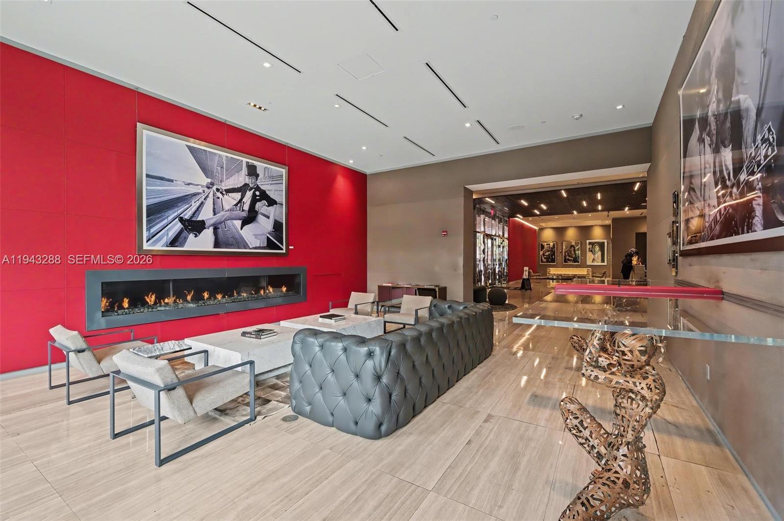 1080 Brickell Avenue, Unit 209 Miami, FL 33131 - Photo 6 of 37 a living room with furniture rug and window
