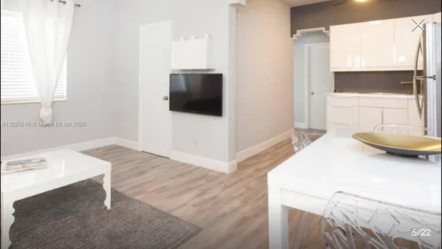a en suite bathroom with a sink and a mirror