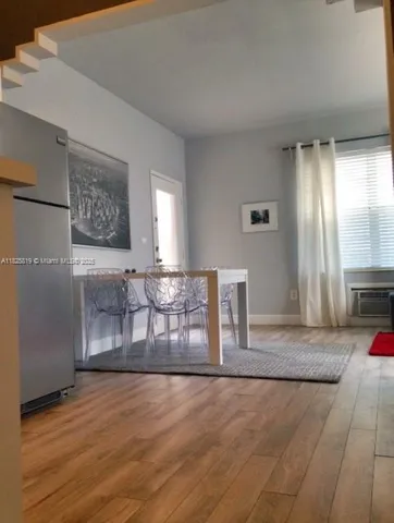 a view of a livingroom with a furniture