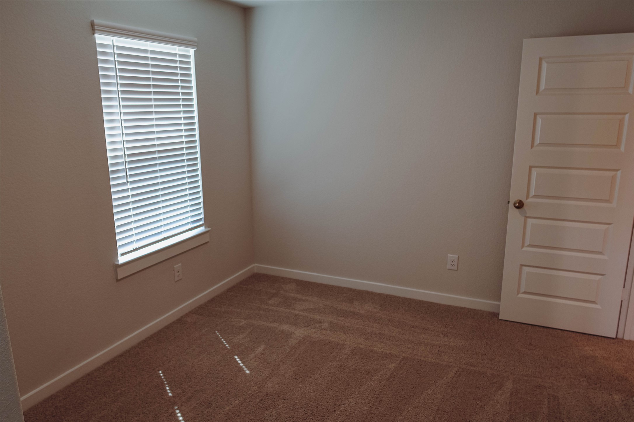 16 Courageous Way Magnolia, TX 77354 - Photo 18 of 19 an empty room with a window