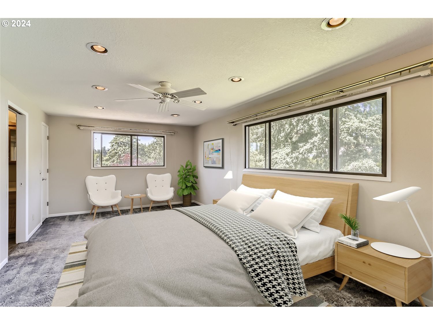 4009 Southeast View Acres Road Milwaukie, OR 97267 - Photo 20 of 37 a bedroom with a large bed and a window