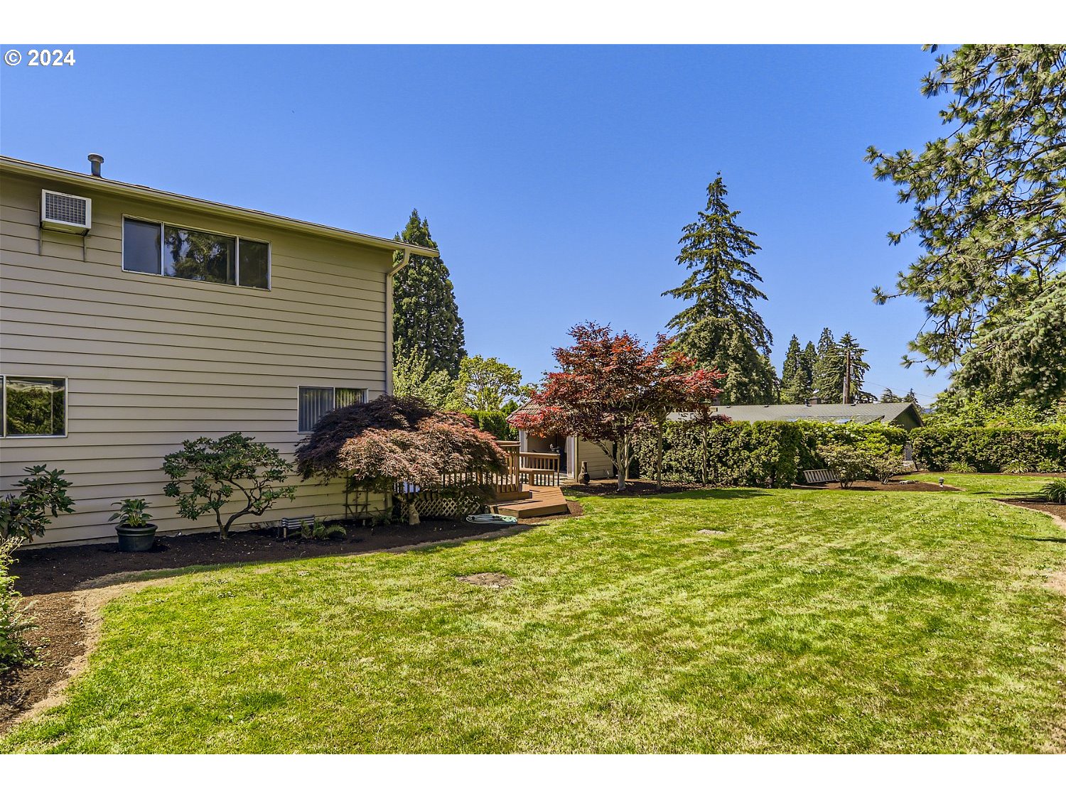 4009 Southeast View Acres Road Milwaukie, OR 97267 - Photo 26 of 37 a house view with a garden space