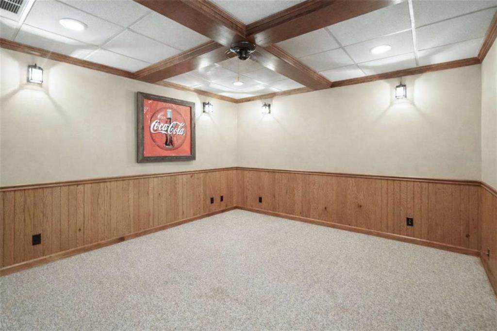 1660 A Maple Ridge Drive Loganville, GA 30052 - Photo 37 of 51 an empty room with windows