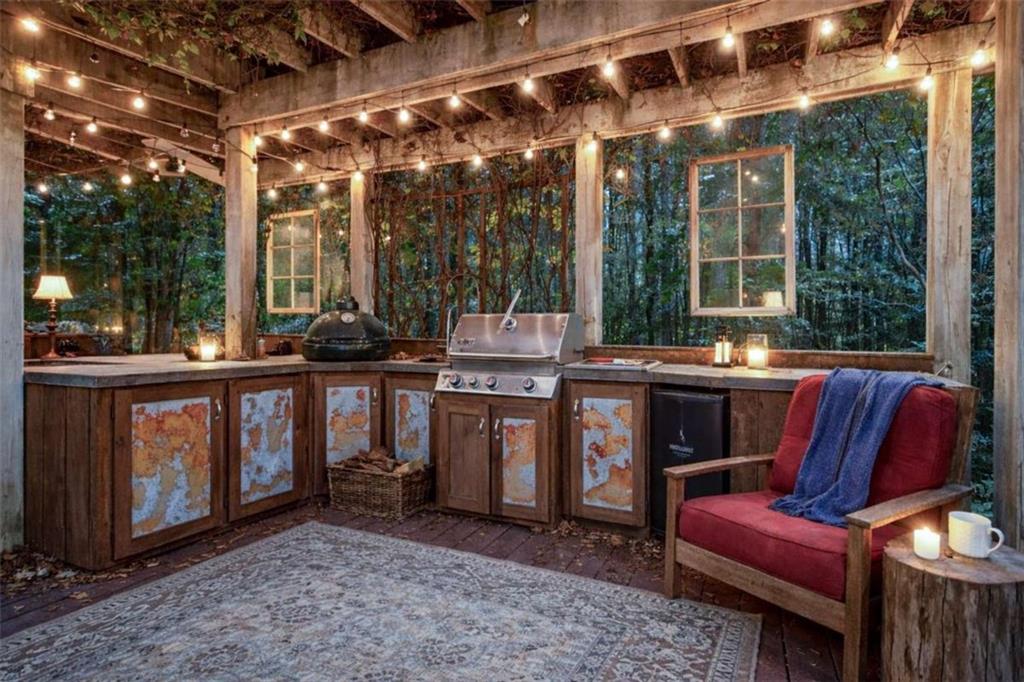 1660 A Maple Ridge Drive Loganville, GA 30052 - Photo 43 of 51 a view of a chairs and tables in the patio