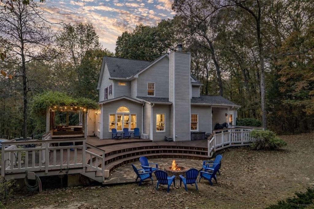 1660 A Maple Ridge Drive Loganville, GA 30052 - Photo 46 of 51 a house view with a sitting space garden view with a tree