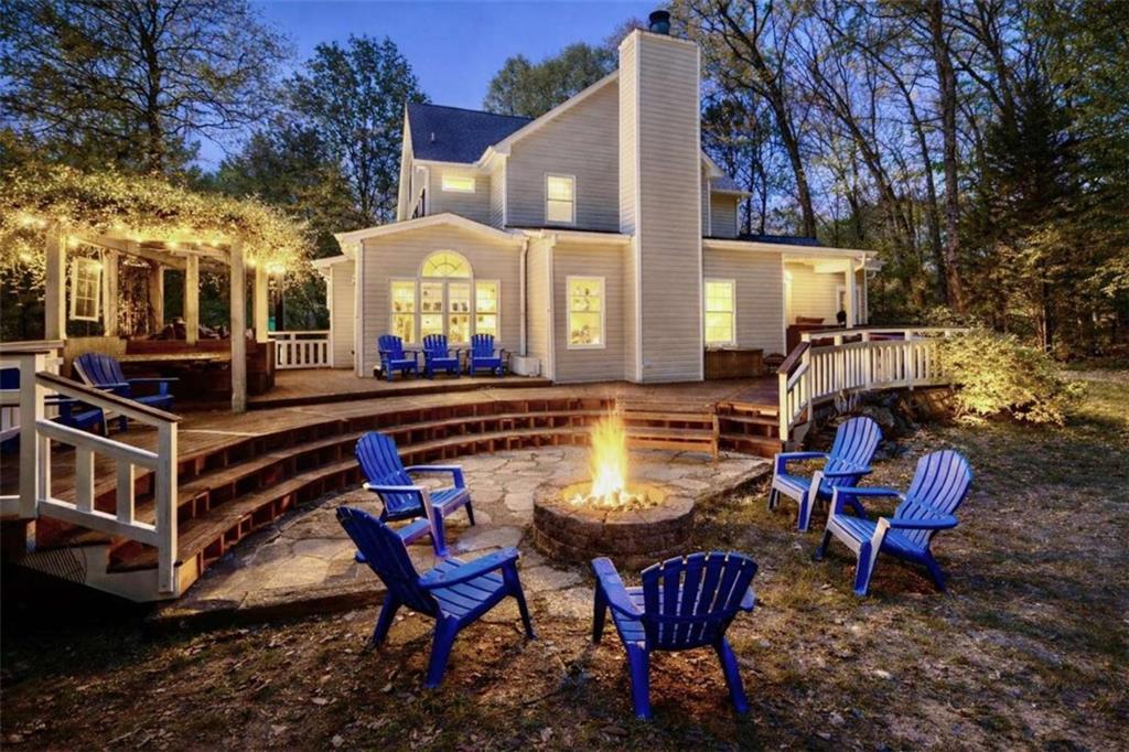 1660 A Maple Ridge Drive Loganville, GA 30052 - Photo 48 of 51 a backyard of a house with outdoor seating