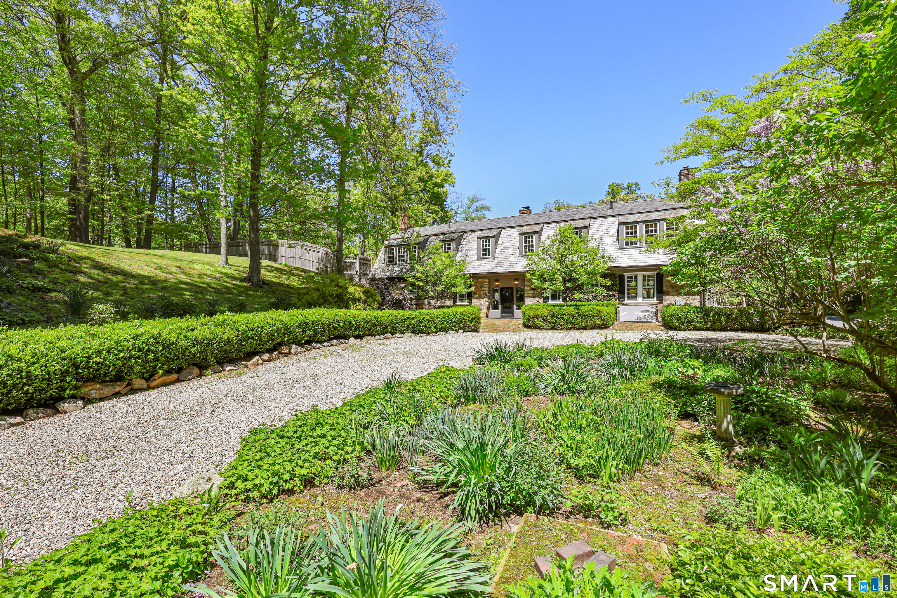 4 Old Barlow Mountain Road Ridgefield, CT 06877 - Photo 11 of 40 a view of a house with a yard