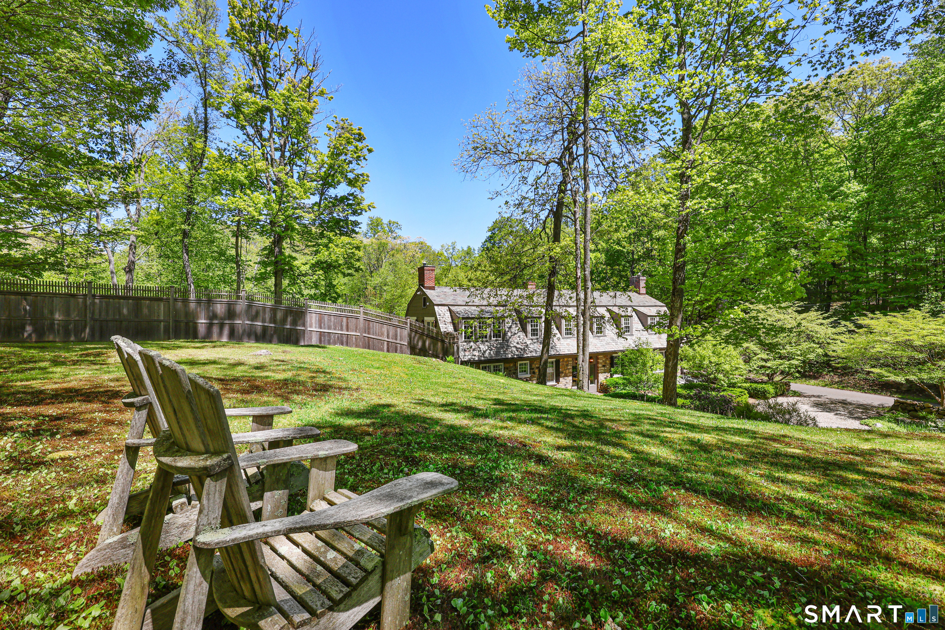 4 Old Barlow Mountain Road Ridgefield, CT 06877 - Photo 12 of 40 a view of a swimming pool with a patio