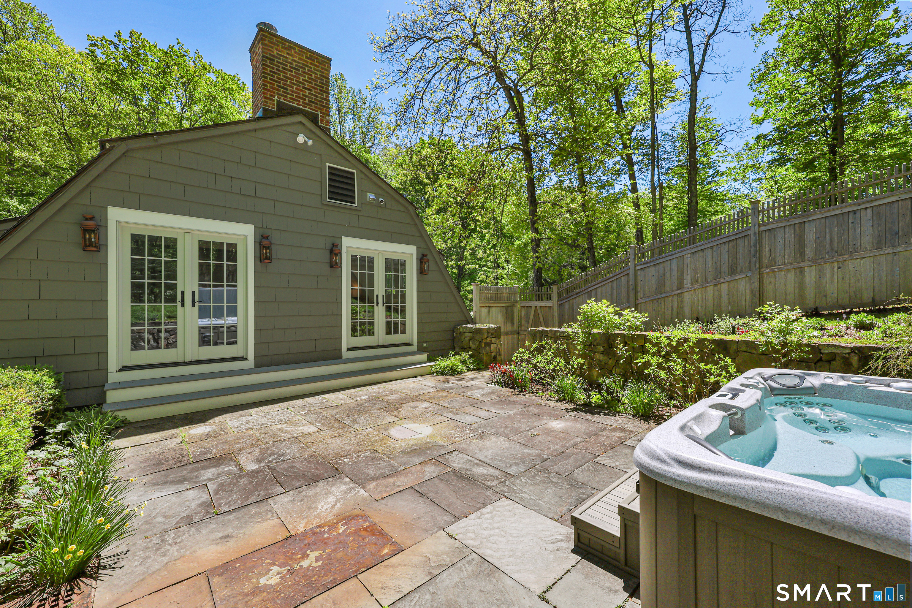 4 Old Barlow Mountain Road Ridgefield, CT 06877 - Photo 23 of 40 a house view with a backyard space