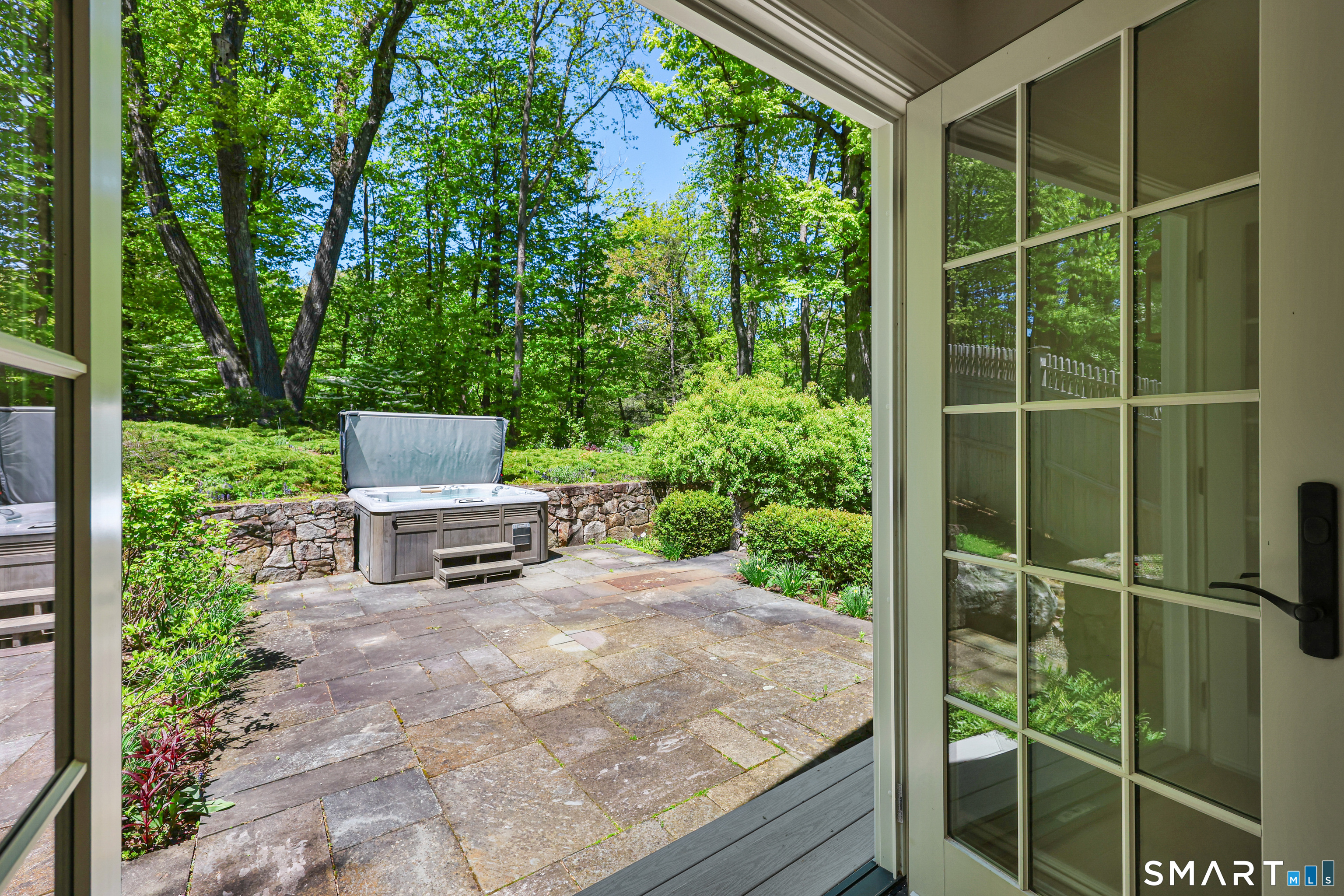 4 Old Barlow Mountain Road Ridgefield, CT 06877 - Photo 24 of 40 a backyard of a house with seating space