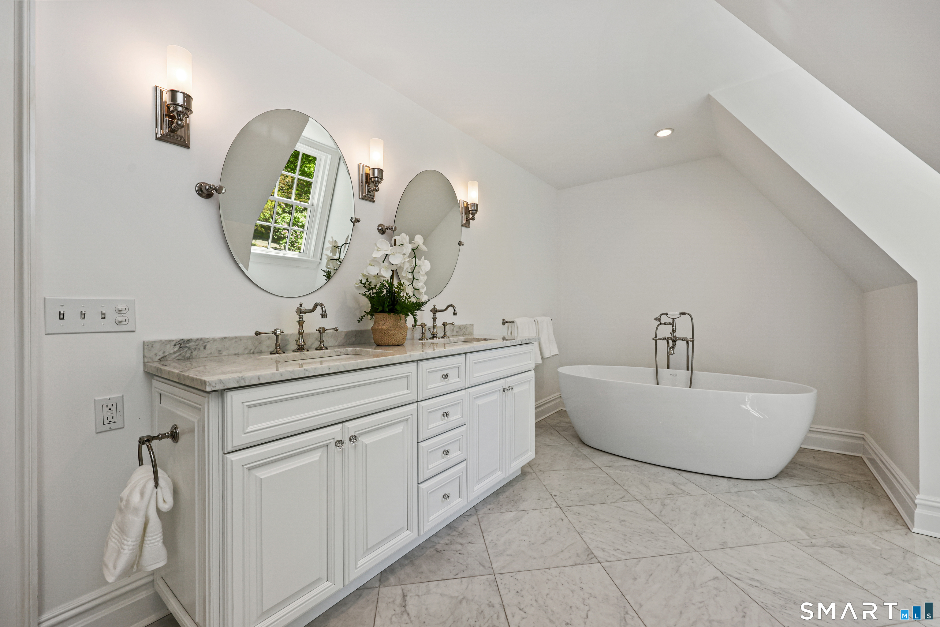 4 Old Barlow Mountain Road Ridgefield, CT 06877 - Photo 25 of 40 a bathroom with a granite countertop sink and a mirror