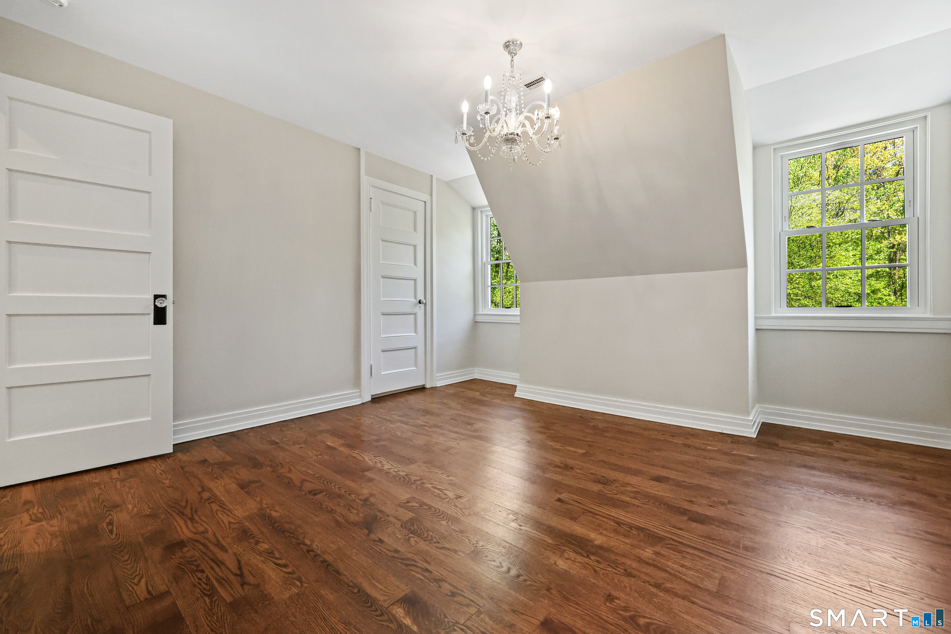 4 Old Barlow Mountain Road Ridgefield, CT 06877 - Photo 28 of 40 wooden floor in an empty room with a window
