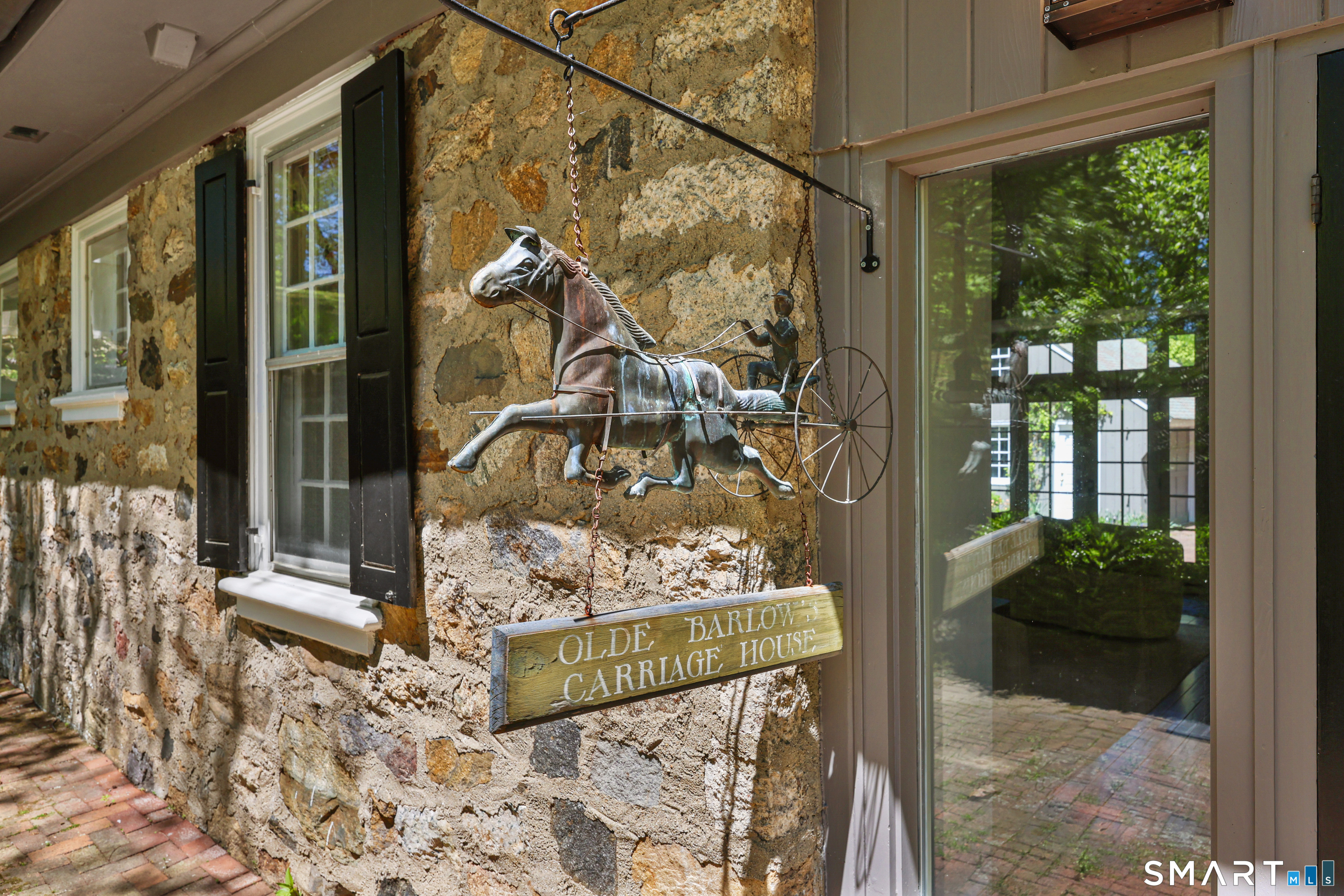 4 Old Barlow Mountain Road Ridgefield, CT 06877 - Photo 3 of 40 a view of a porch of the house