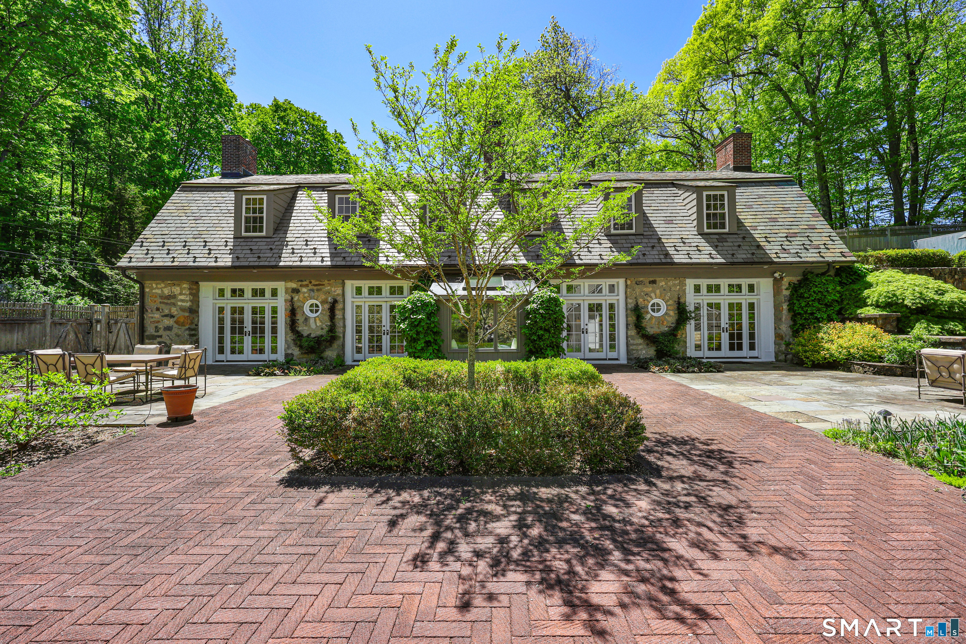 4 Old Barlow Mountain Road Ridgefield, CT 06877 - Photo 39 of 40 a front view of a house with garden