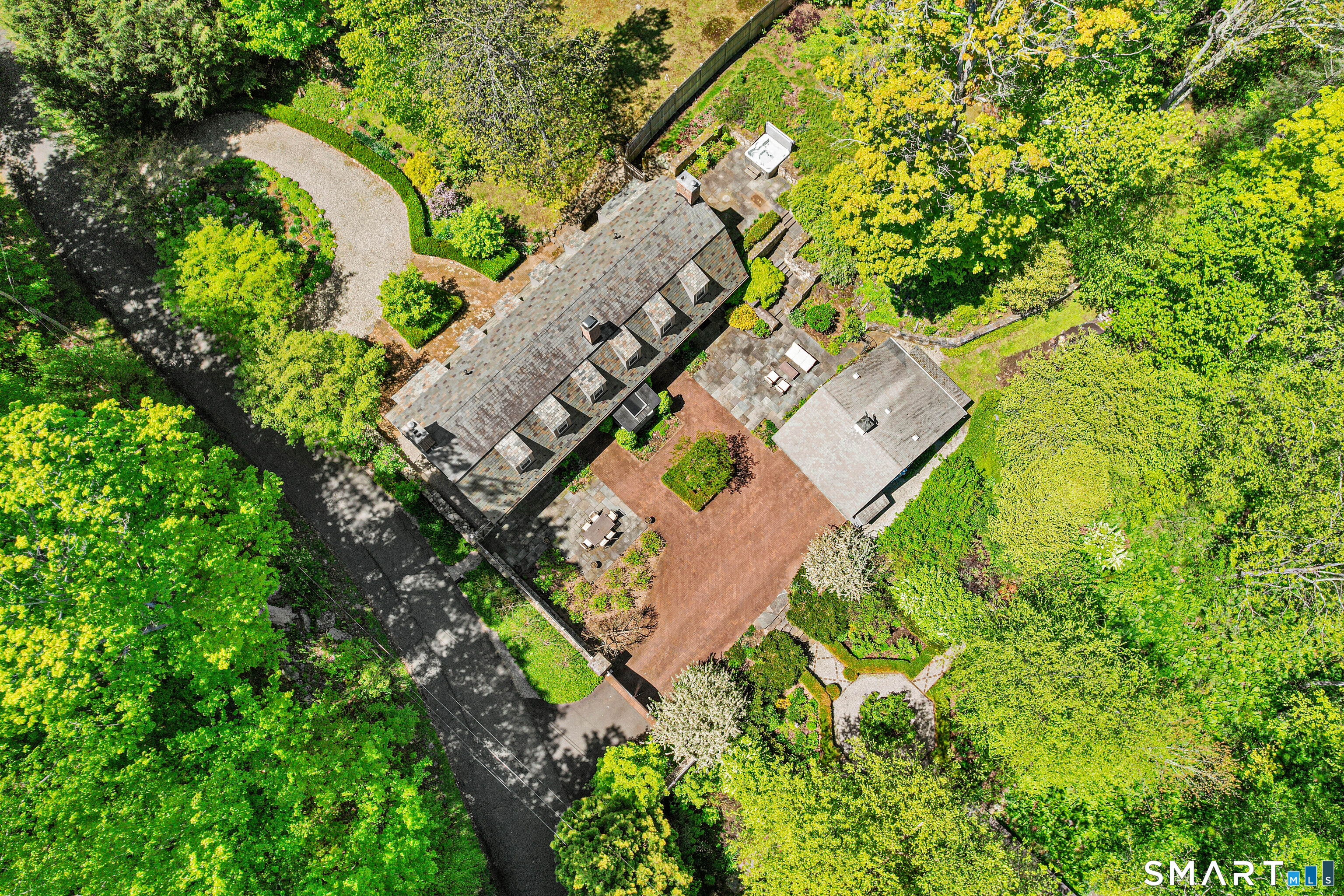 4 Old Barlow Mountain Road Ridgefield, CT 06877 - Photo 40 of 40 an aerial view of a house with a yard and swimming pool