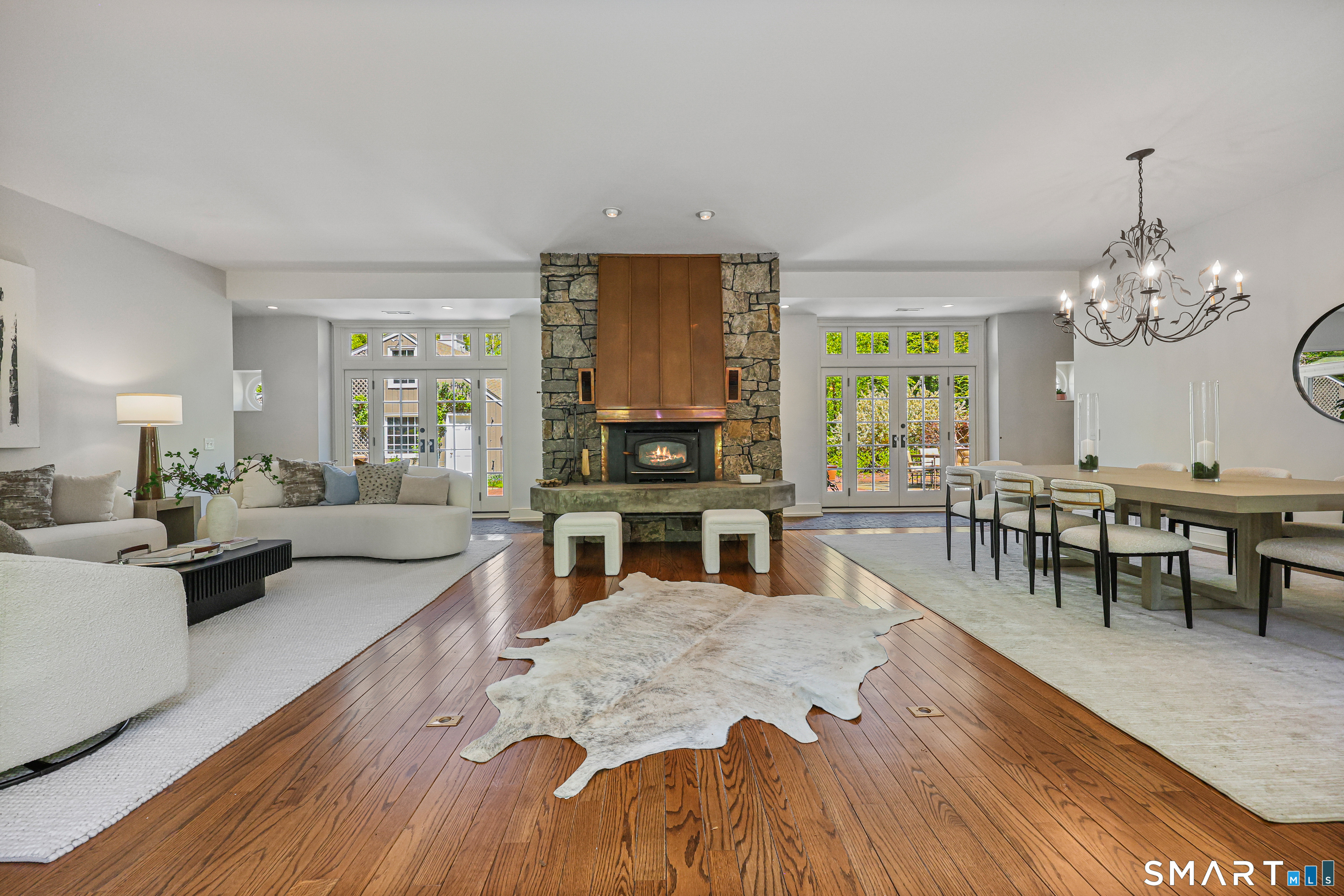 4 Old Barlow Mountain Road Ridgefield, CT 06877 - Photo 5 of 40 a living room with furniture and a wooden floor