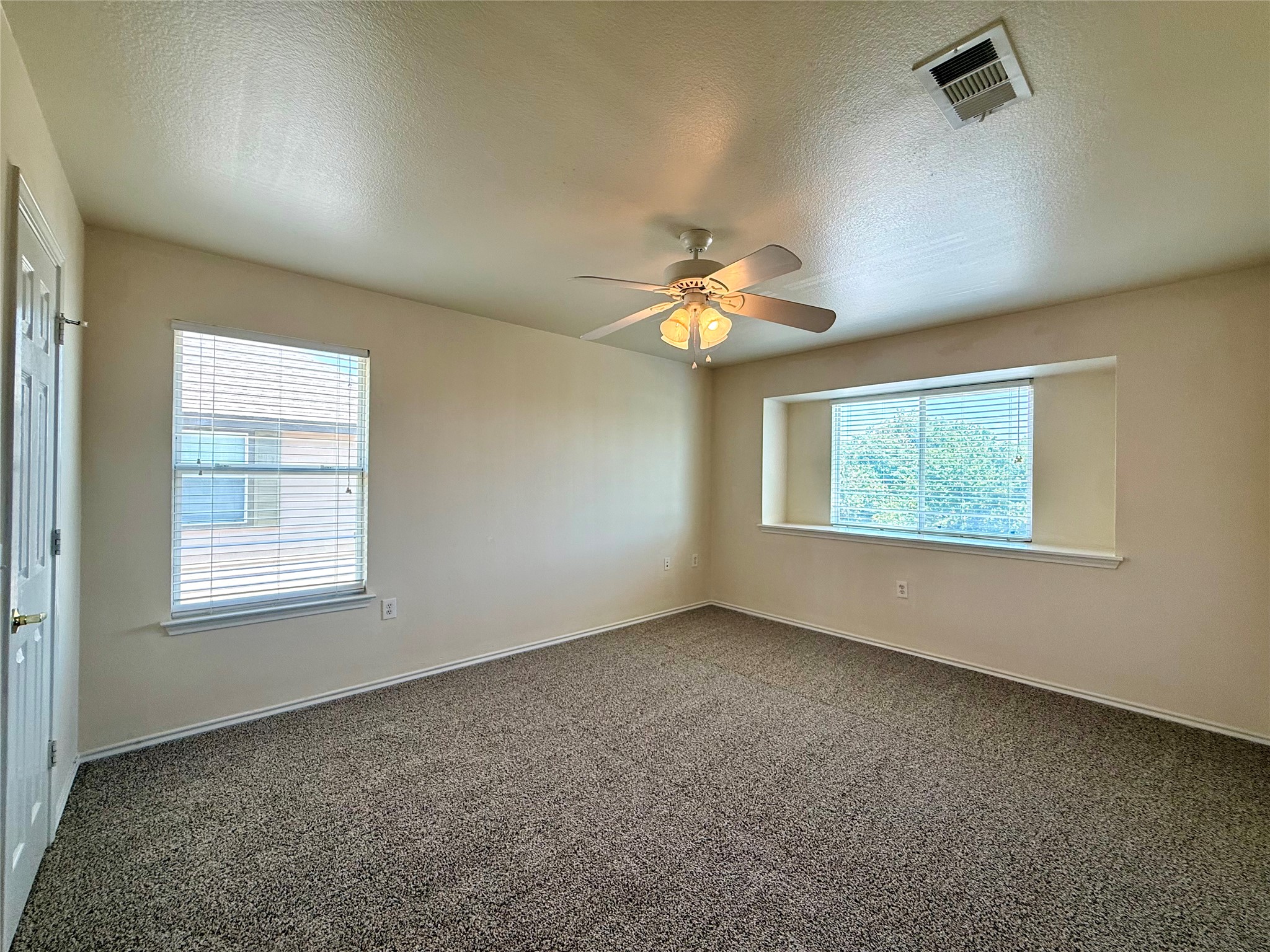 6912 Meador Avenue, Unit A Austin, TX 78752 - Photo 14 of 24 a view of an empty room with a window