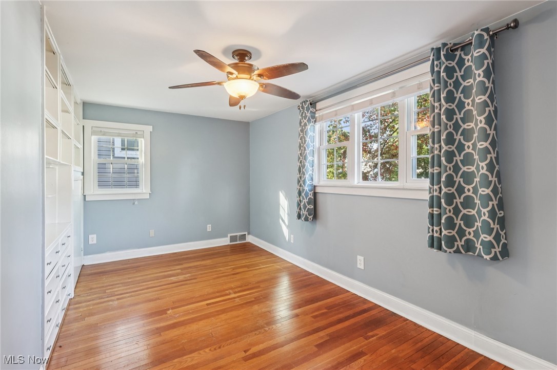 1151 Croyden Road Lyndhurst, OH 44124 - Photo 18 of 37 bedroom featuring light wood-style flooring and a ceiling fan