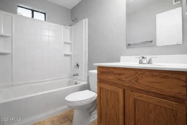 a bathroom with a sink a toilet and a bathtub