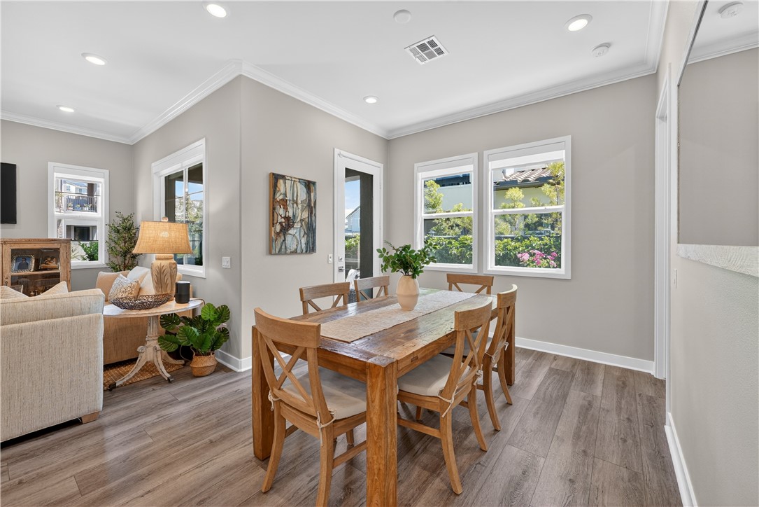 752 Sunrise Road Rancho Mission Viejo, CA 92694 - Photo 14 of 73 a view of a dining room with furniture window and wooden floor