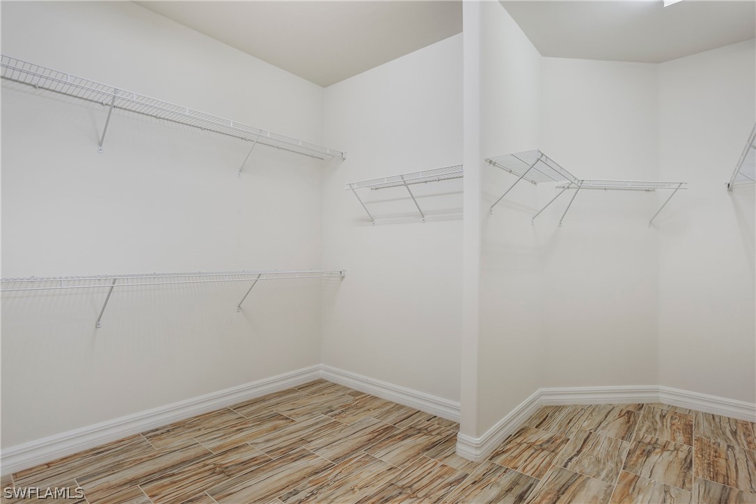 10828 Rutherford Road Fort Myers, FL 33913 - Photo 15 of 31 a view of a room with racks on the wall
