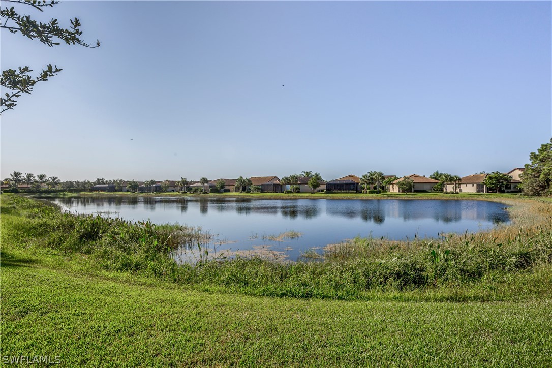 10828 Rutherford Road Fort Myers, FL 33913 - Photo 25 of 31 a view of a lake with a city view