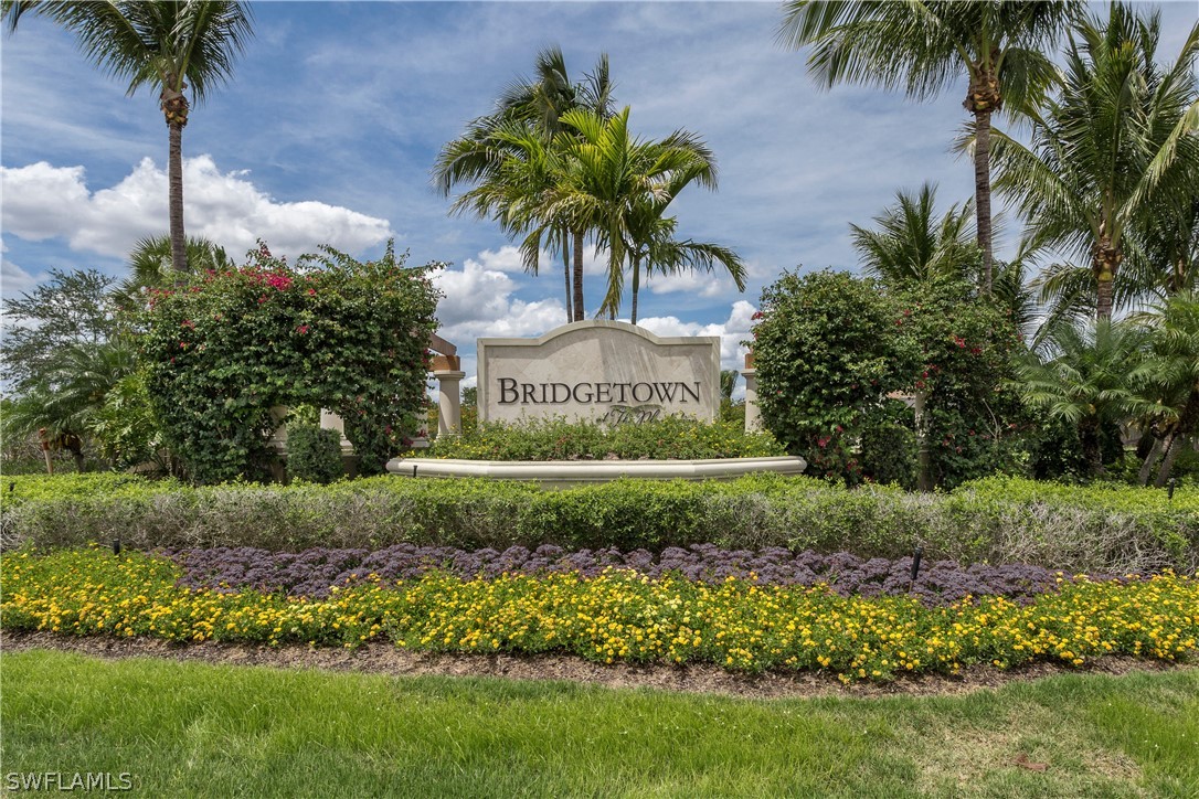 10828 Rutherford Road Fort Myers, FL 33913 - Photo 26 of 31 a view of a palm tree in a yard with a fountain