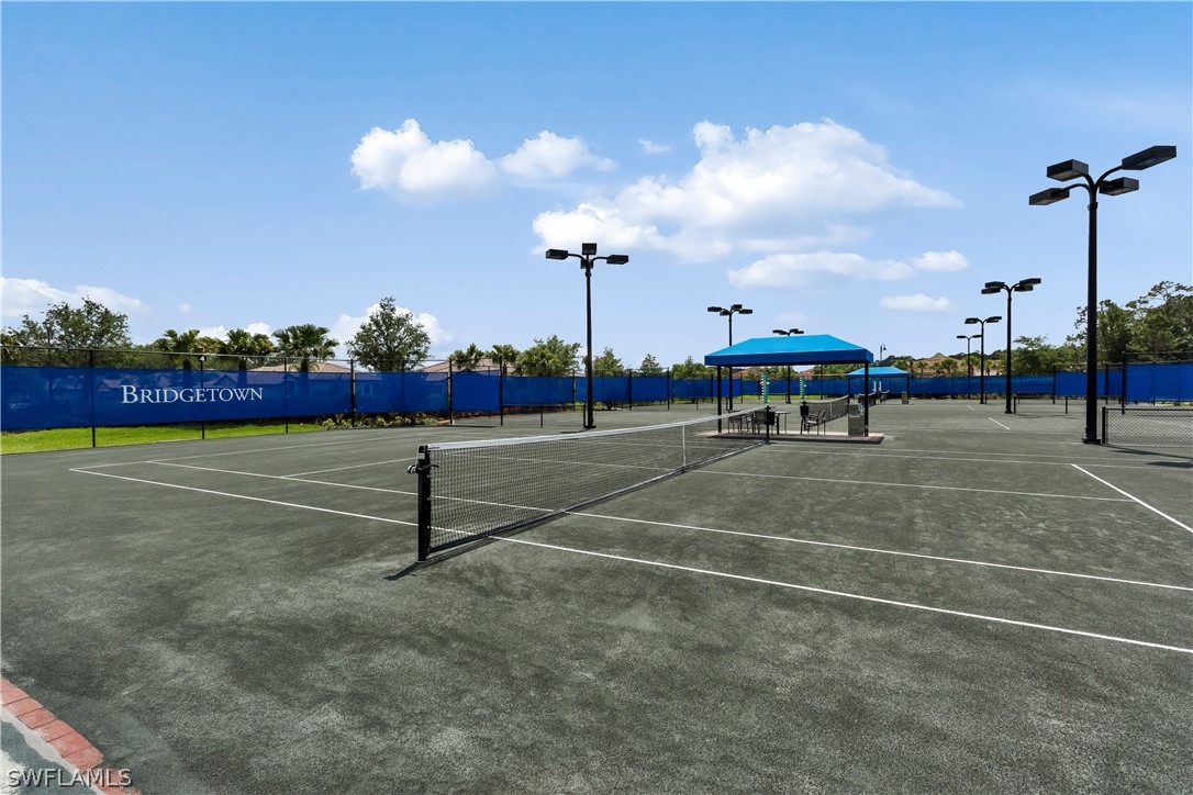10828 Rutherford Road Fort Myers, FL 33913 - Photo 30 of 31 a view of a tennis court