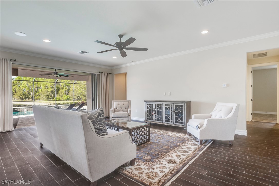 10828 Rutherford Road Fort Myers, FL 33913 - Photo 10 of 31 a living room with furniture and a large window